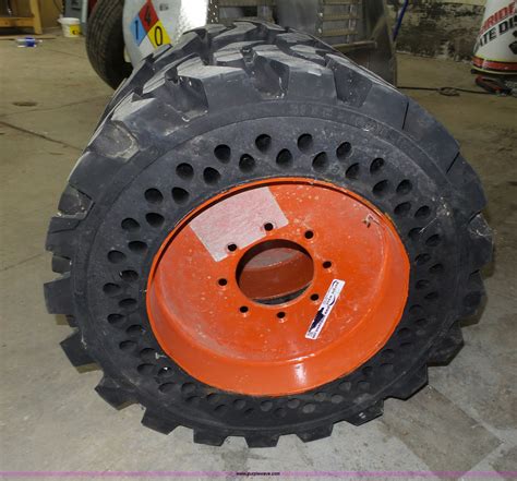 bobcat skid steer snow tires|solid bobcat tires and rims.